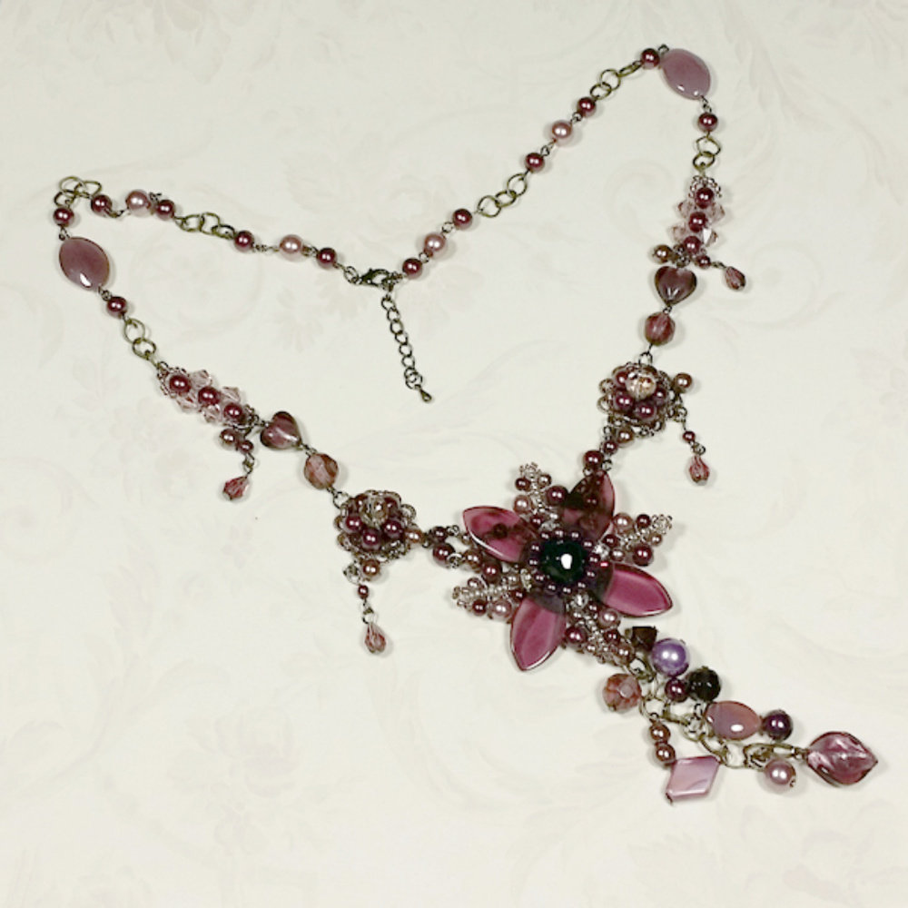 Pink Necklace with star/flora design